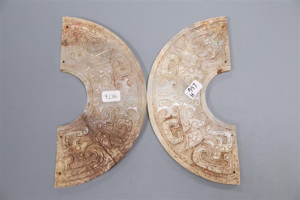 A pair of Chinese archaistic white and russet jade plaques, Huang